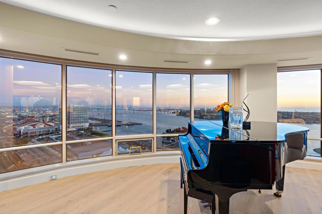 a very nice looking dining room with a large window and dining table