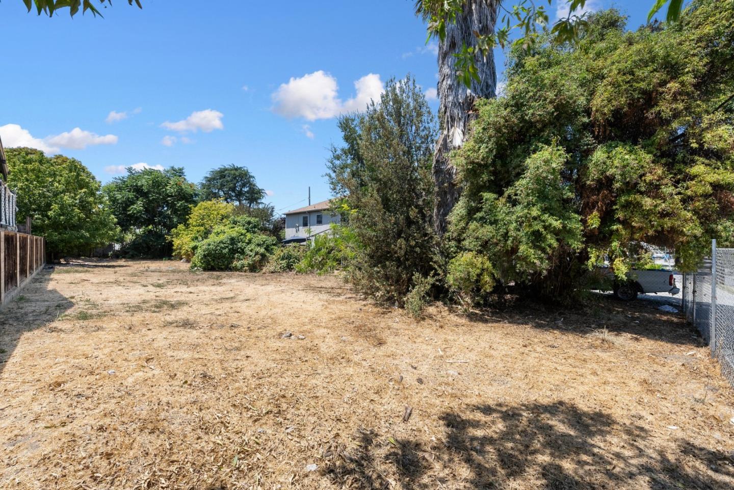 a view of backyard with green space