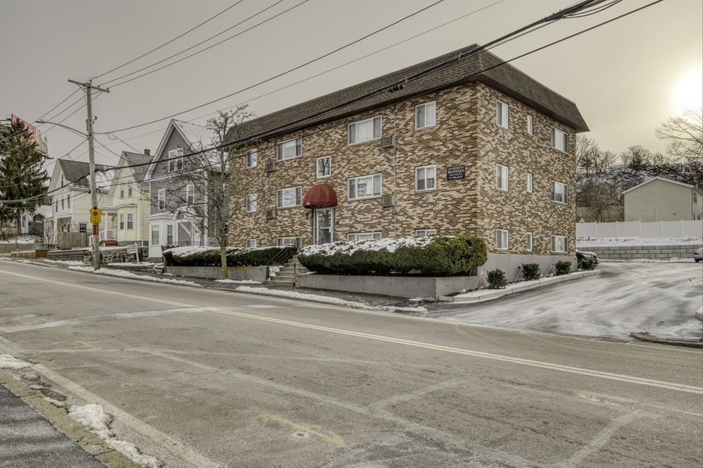 a view of a building on a street