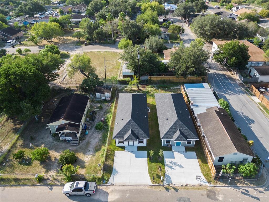 an aerial view of a house with outdoor space