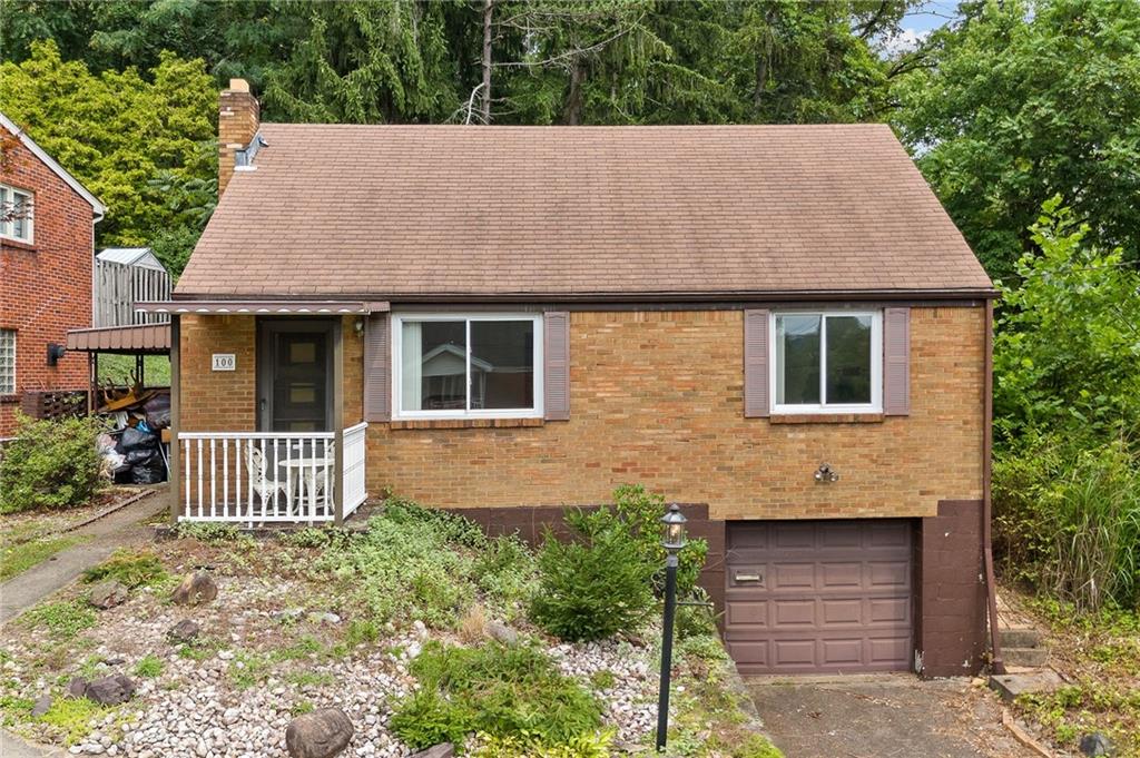 a aerial view of a house with a yard