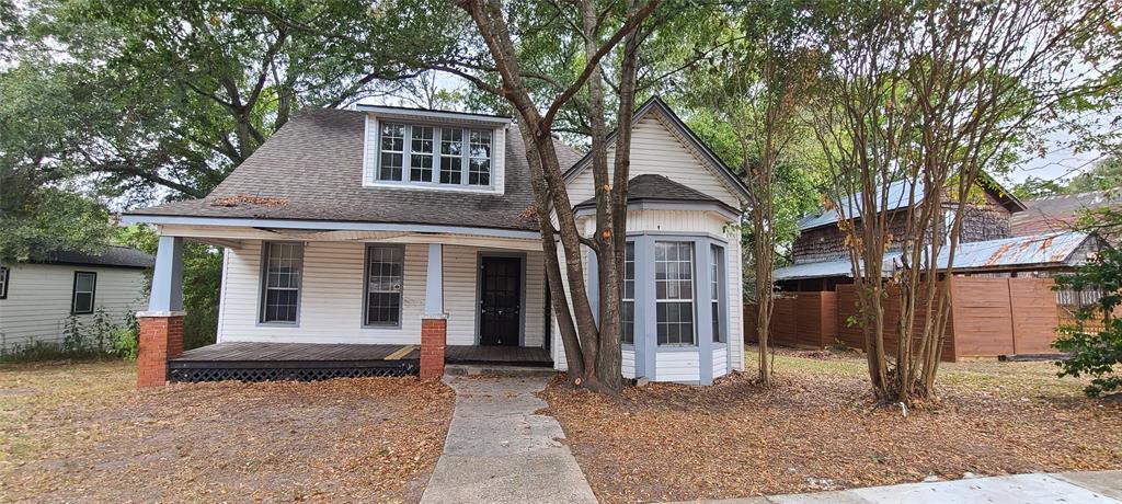 a front view of a house with a porch