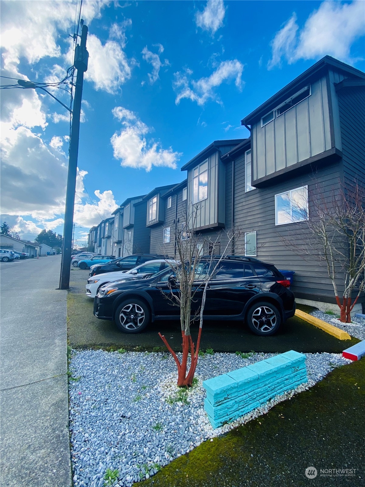 a car parked in front of a house