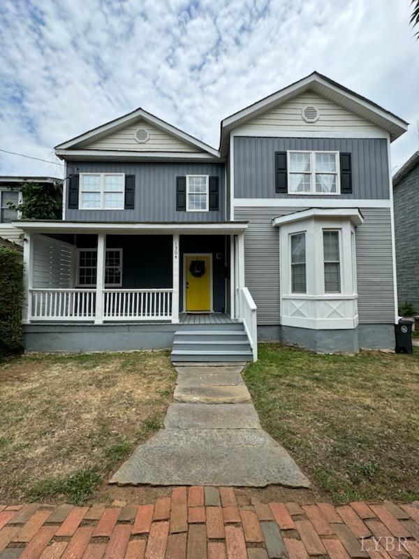 a front view of a house with garage