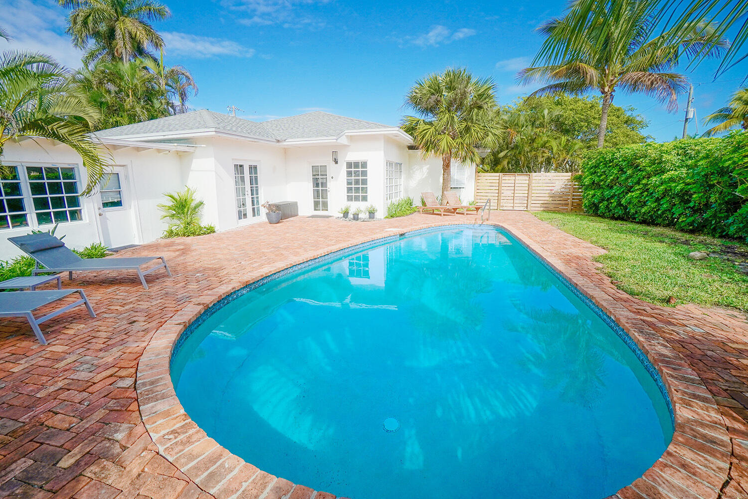 a swimming pool with yard