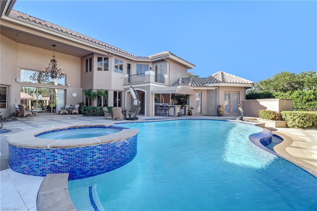 a front view of a house with swimming pool