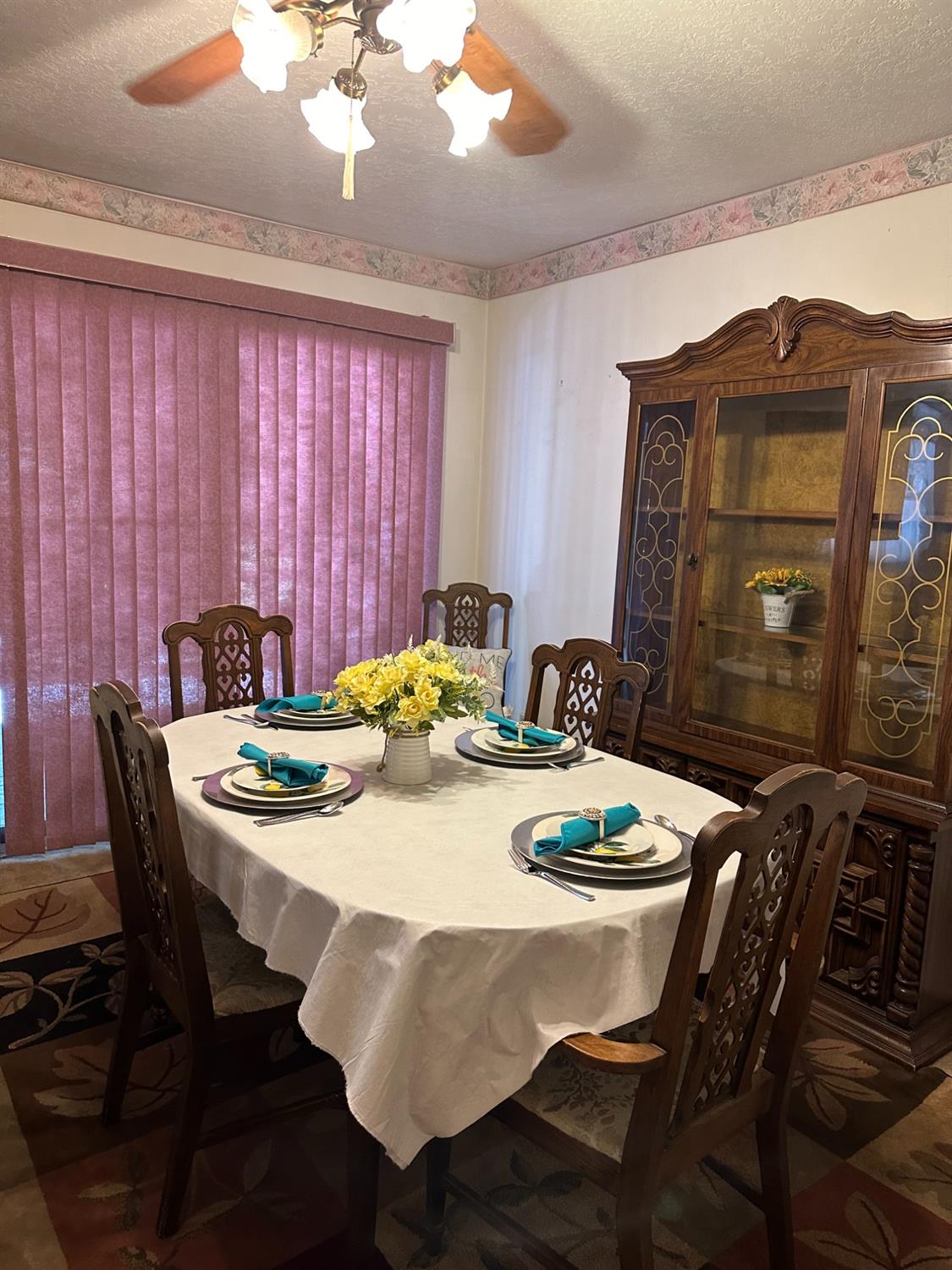 a view of a dining room with furniture window and outside view