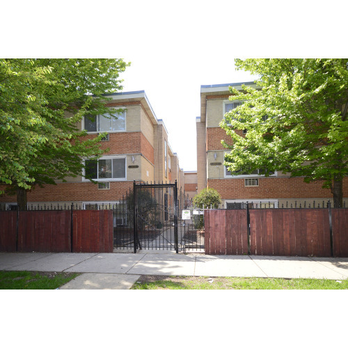 a view of front of house with a yard