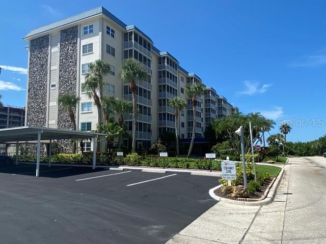 a front view of a building with street view