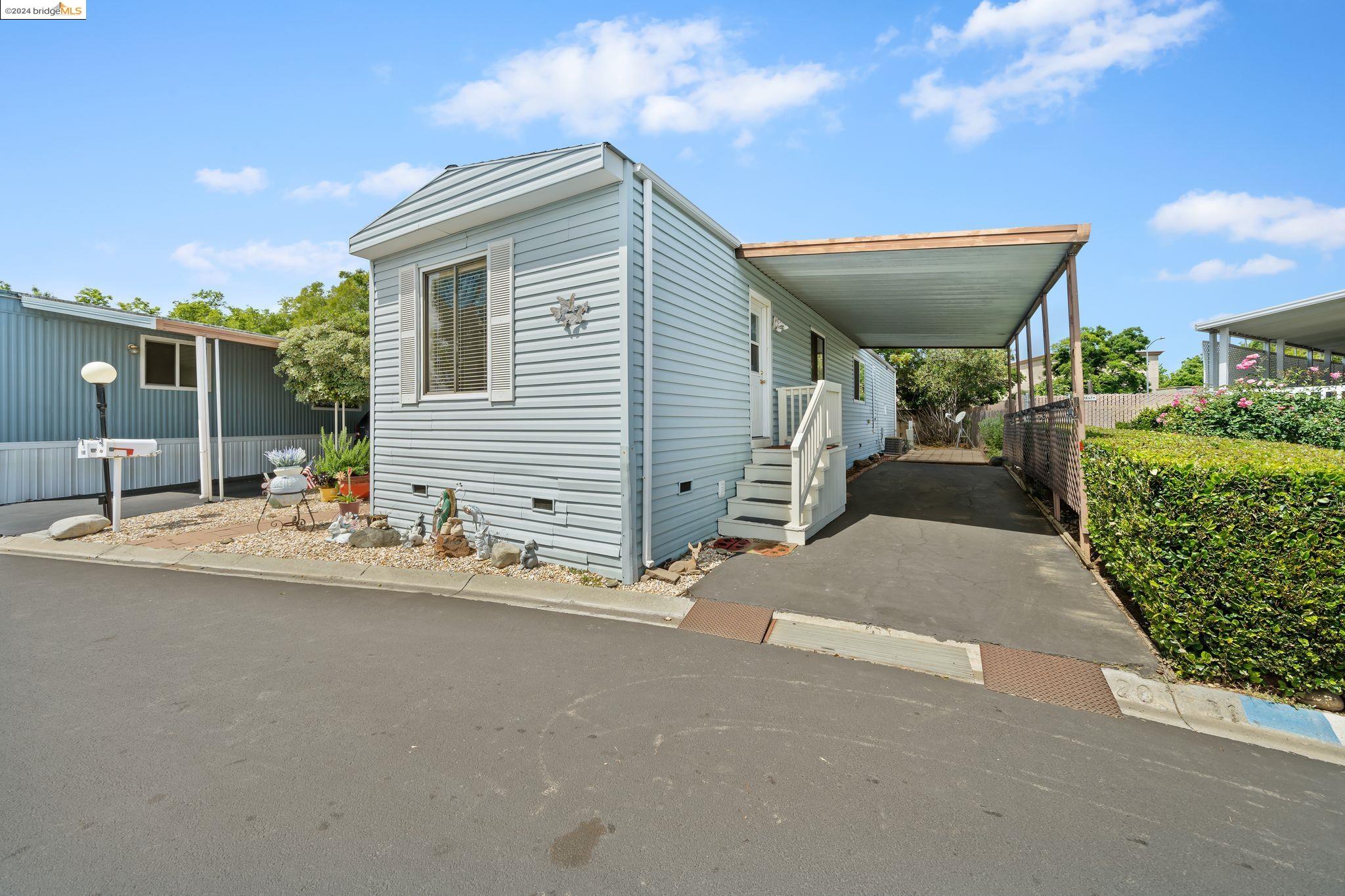 a view of a house with a patio