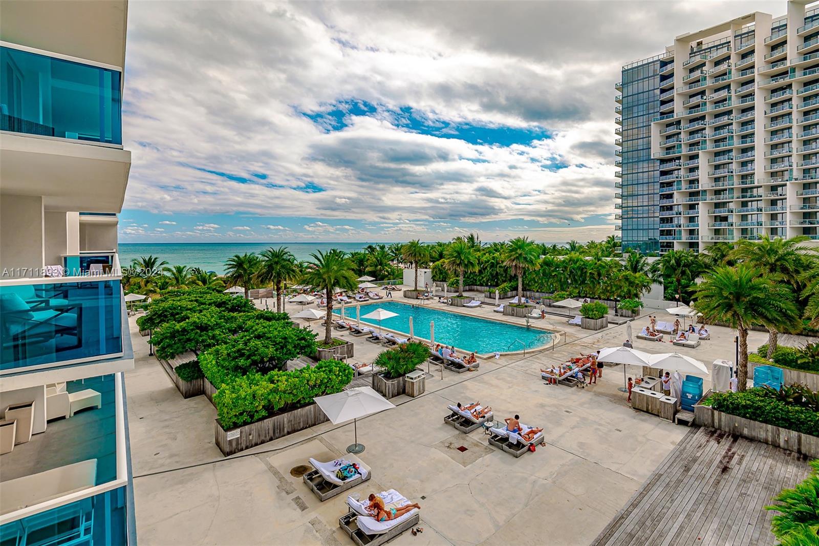 a view of a swimming pool with a patio