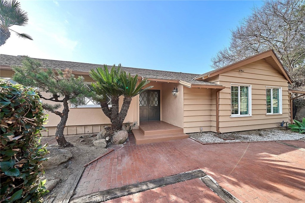 a view of a house with a patio