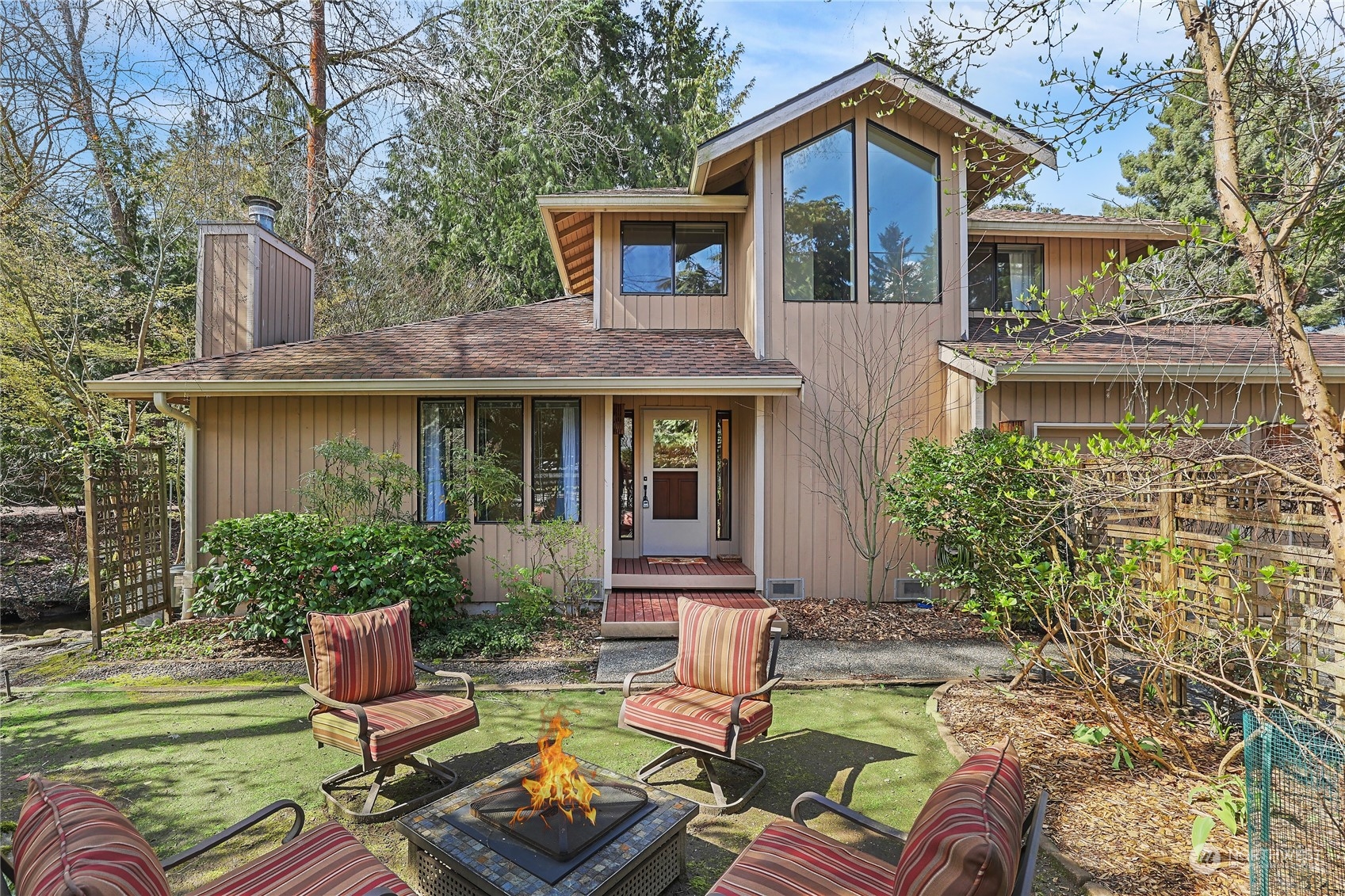 front view of a house with a yard