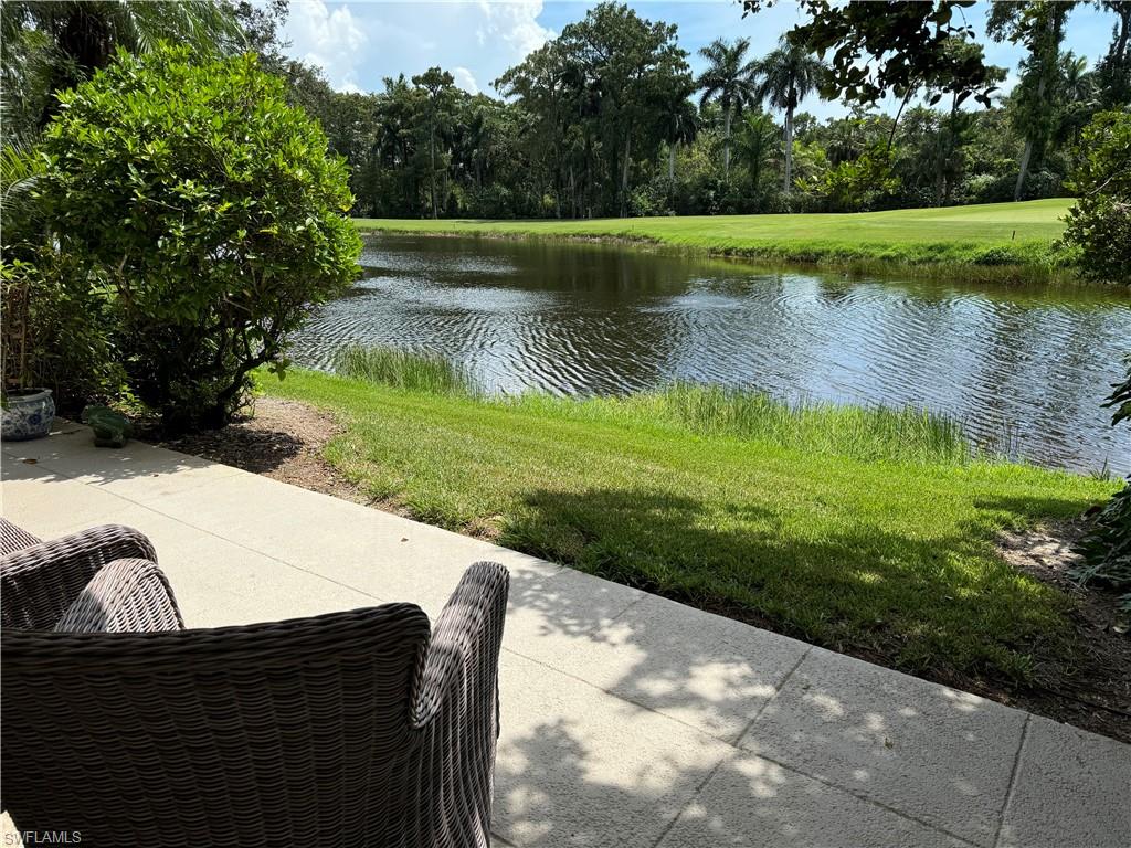 View of patio / terrace with a water view