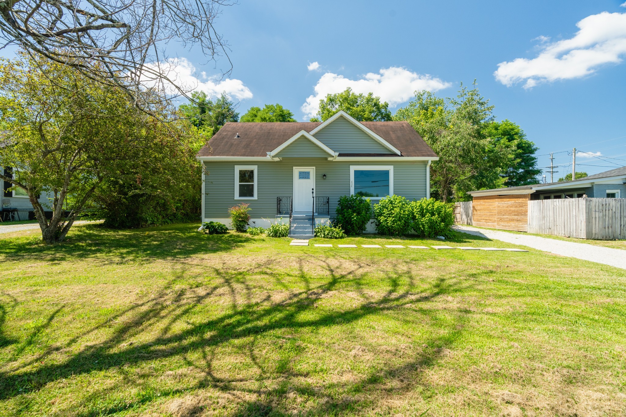 a house view with a garden space