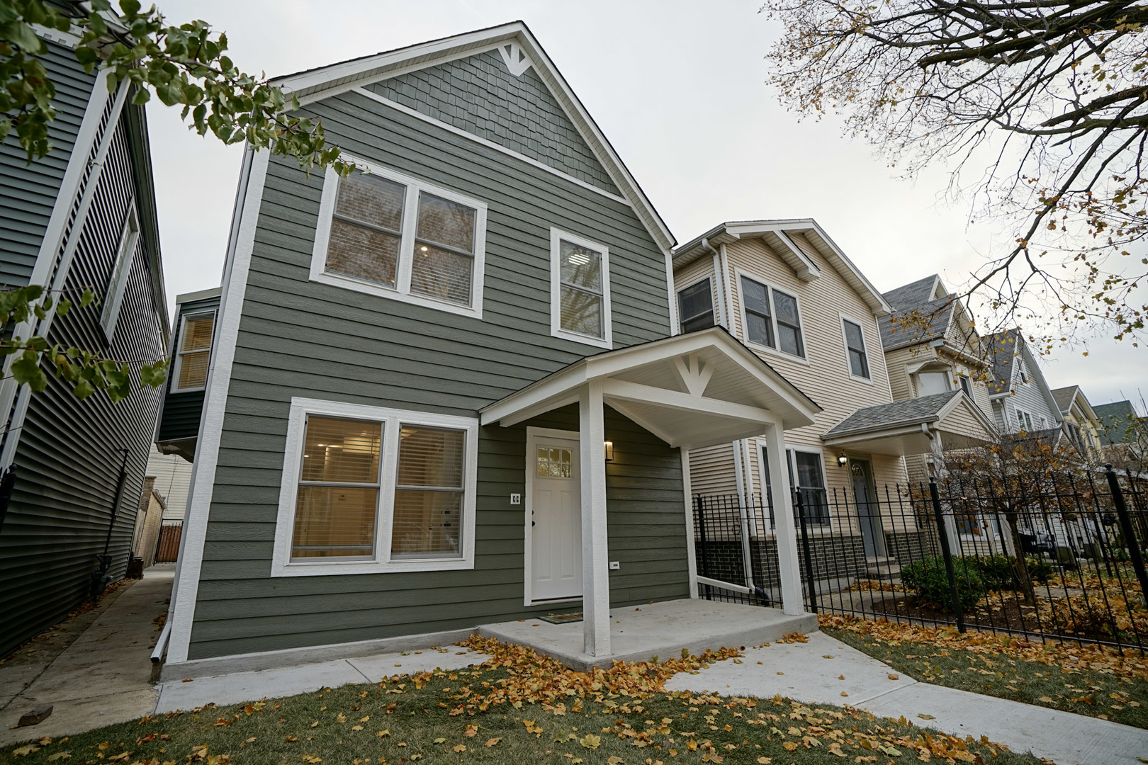 a front view of a house with a porch