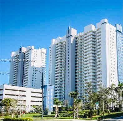 a tall building sitting on the side of a street