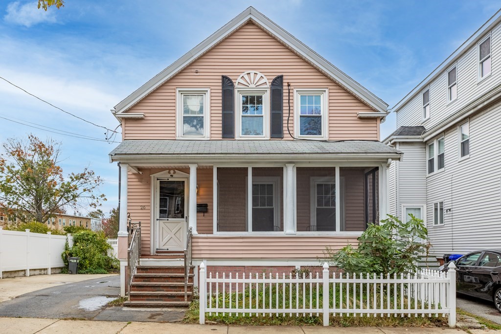 a front view of a house with a porch