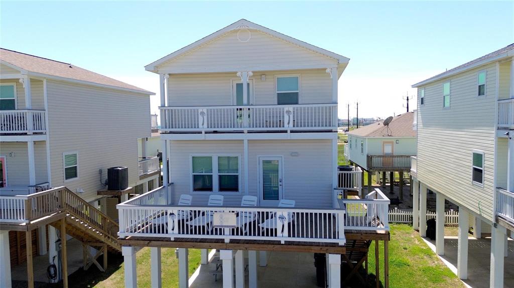 a view of a house with roof deck