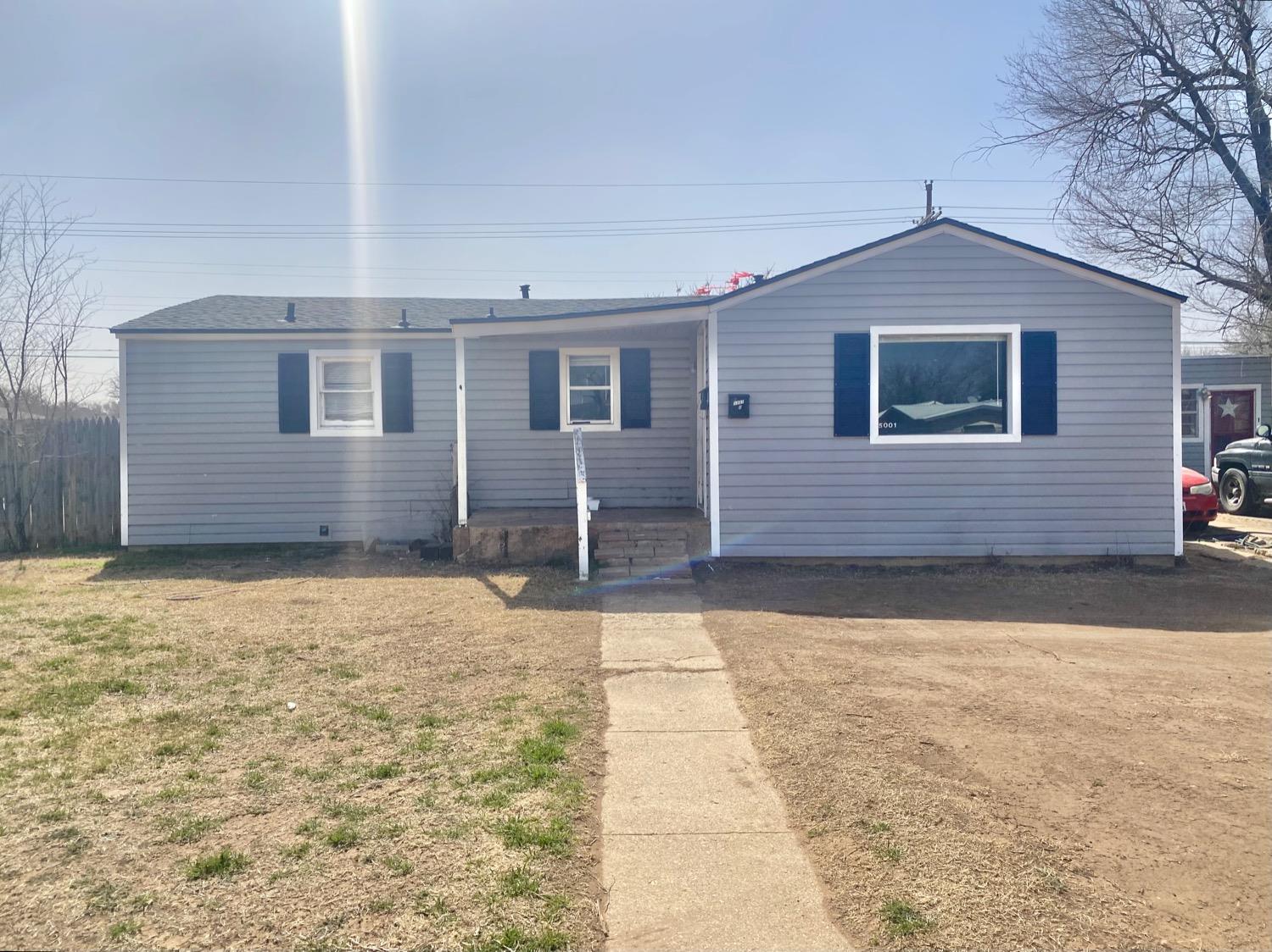 a front view of house with yard