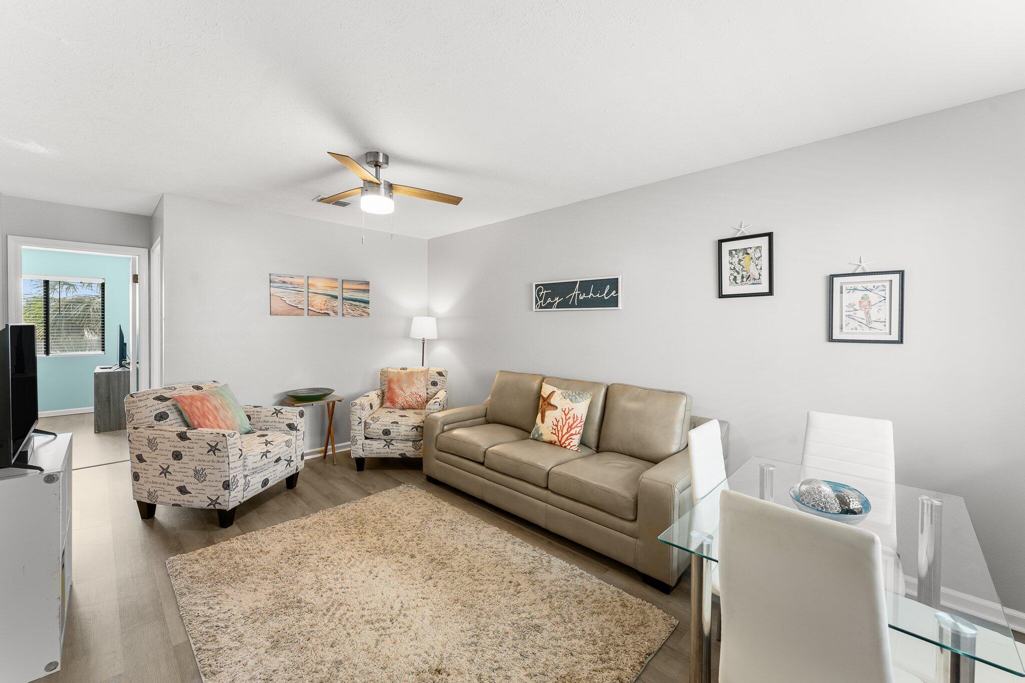 a living room with furniture and a couch