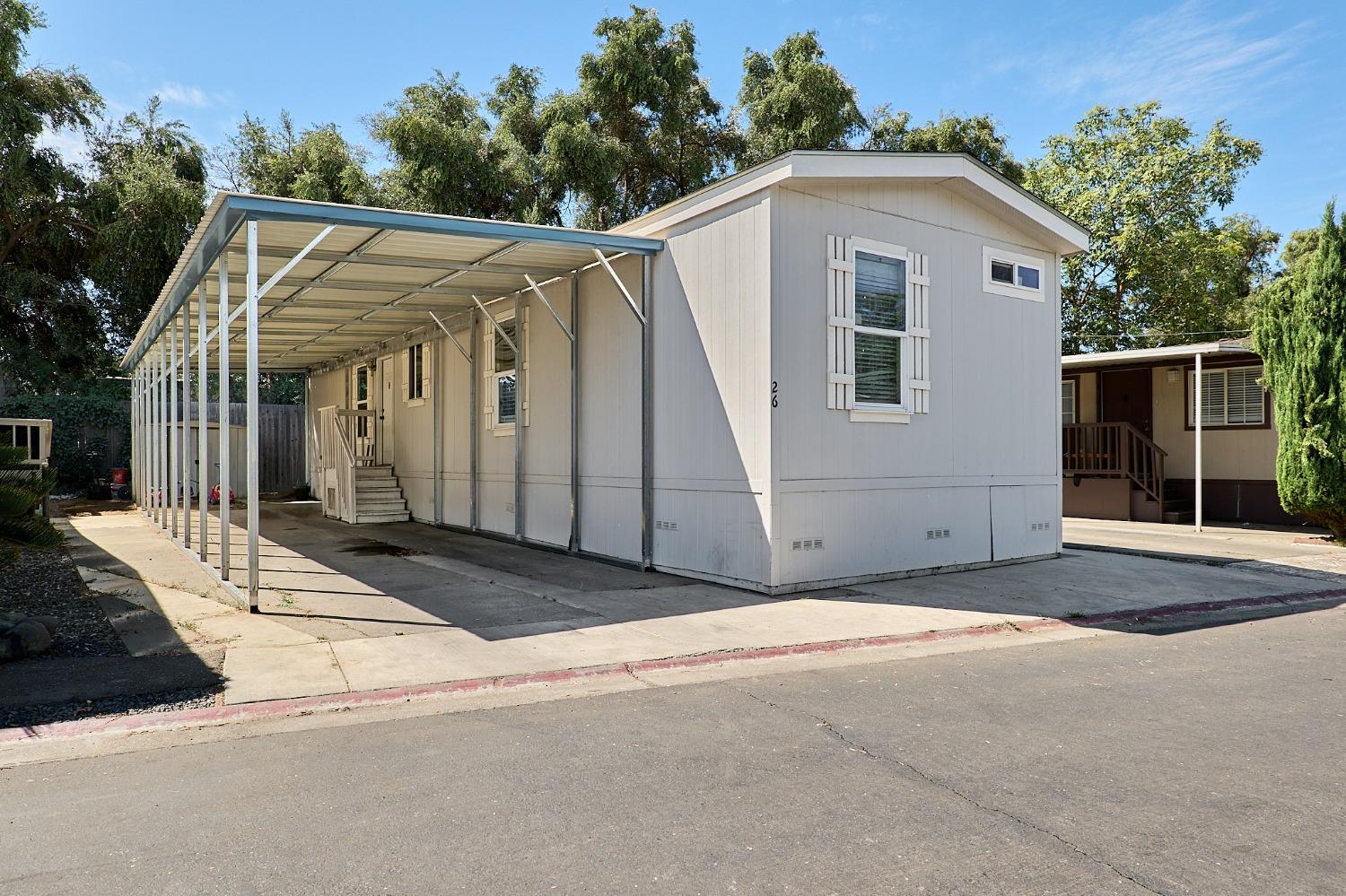 a front view of a house with garage