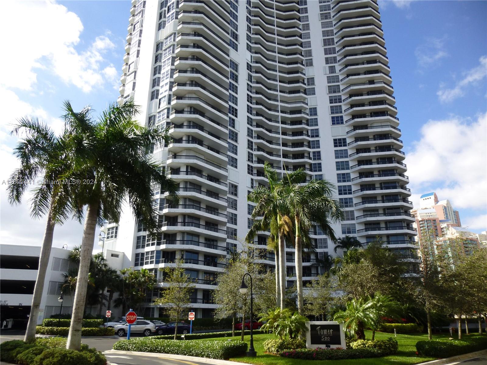 a view of a tall building and a street