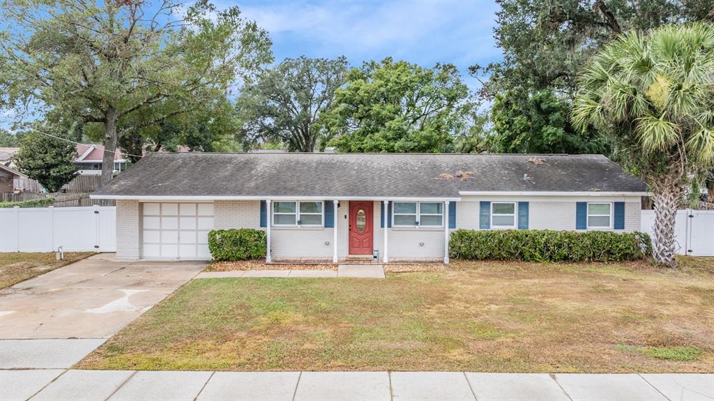 front view of a house with a yard