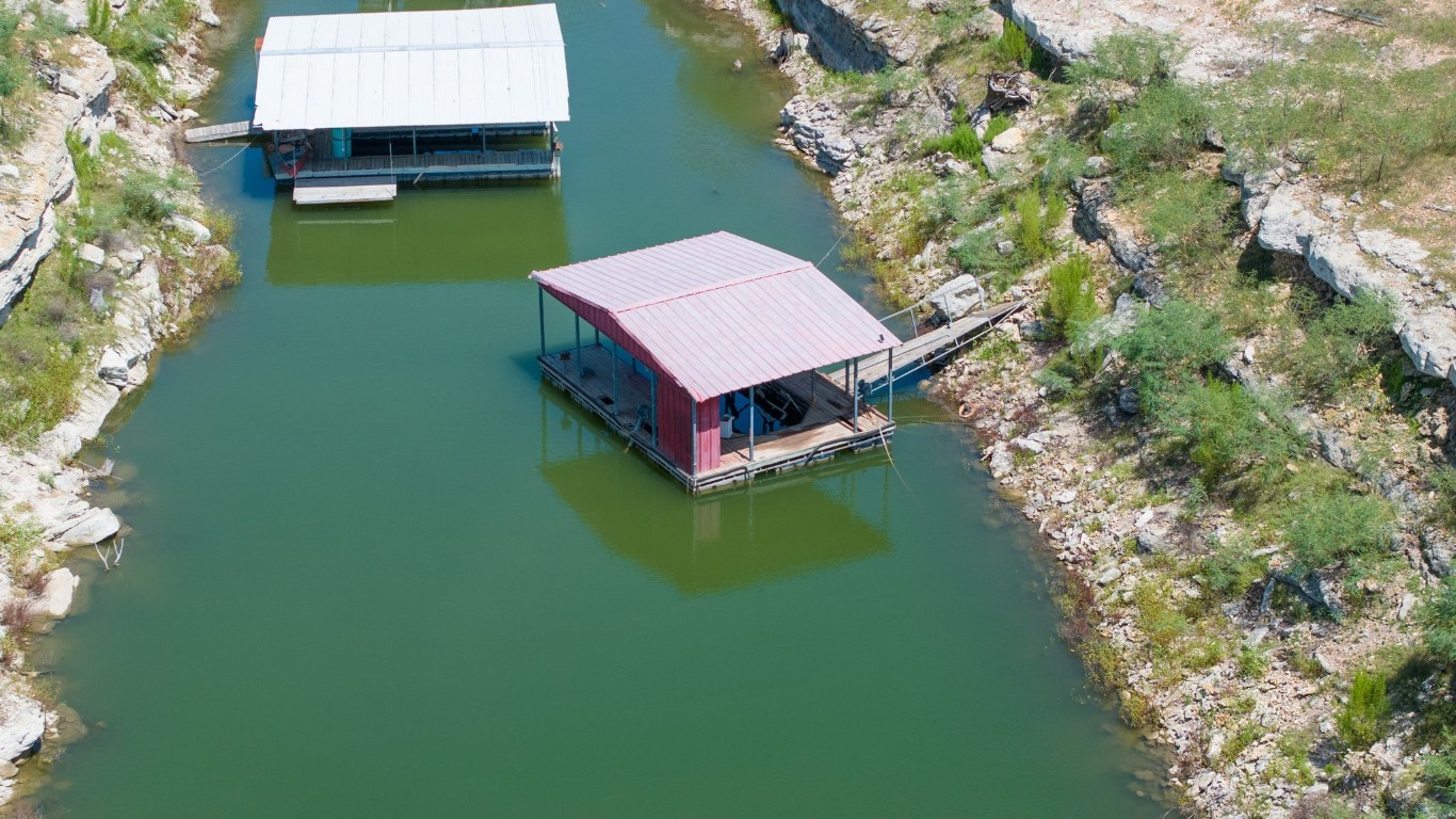 a aerial view of a house with a yard