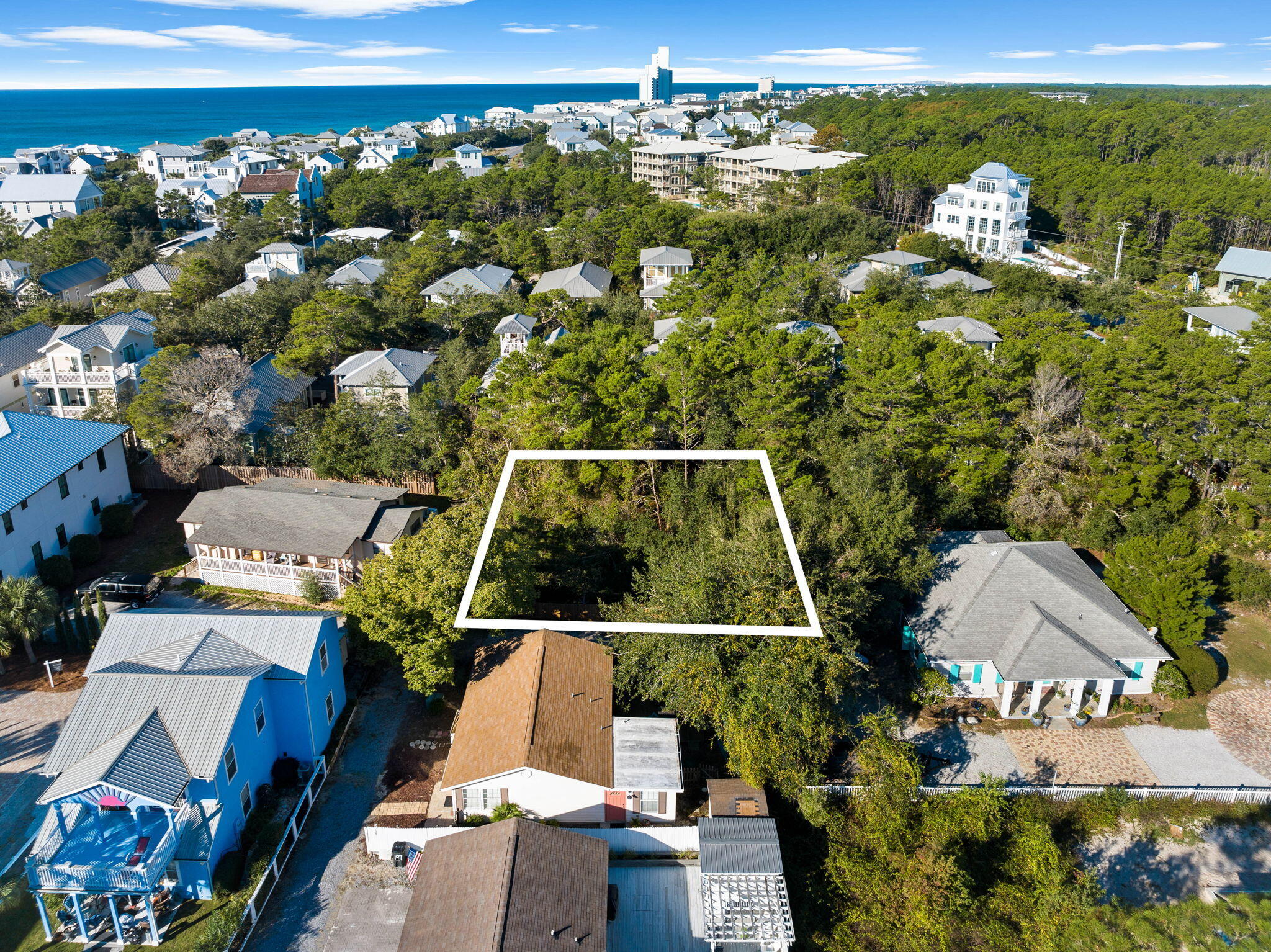 an aerial view of a house with a garden