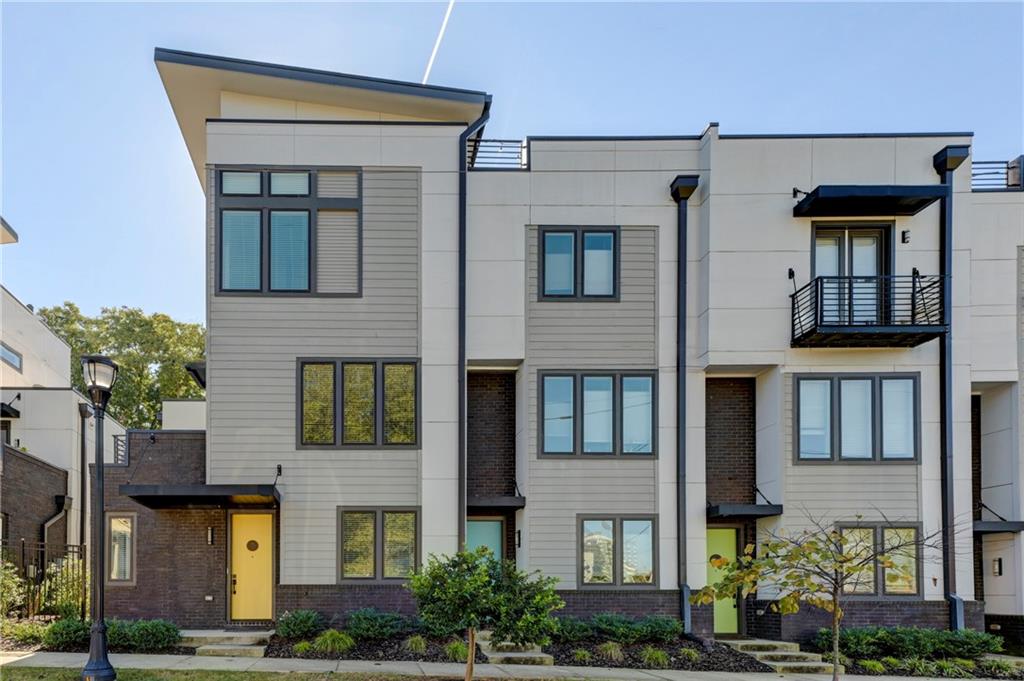 a front view of a multi story residential apartment building