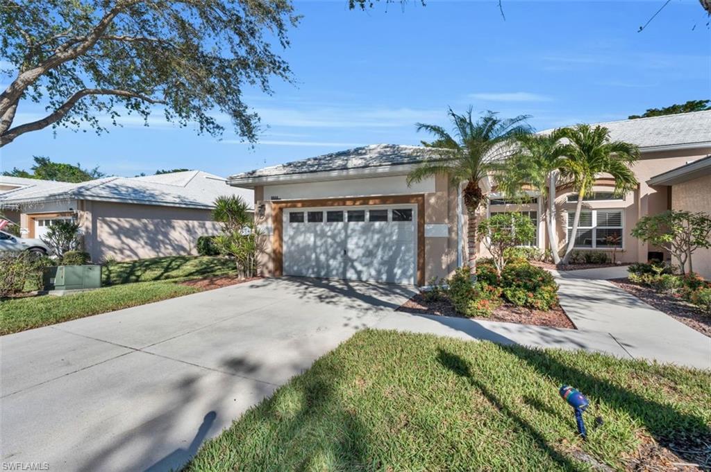 Ranch-style home with a garage