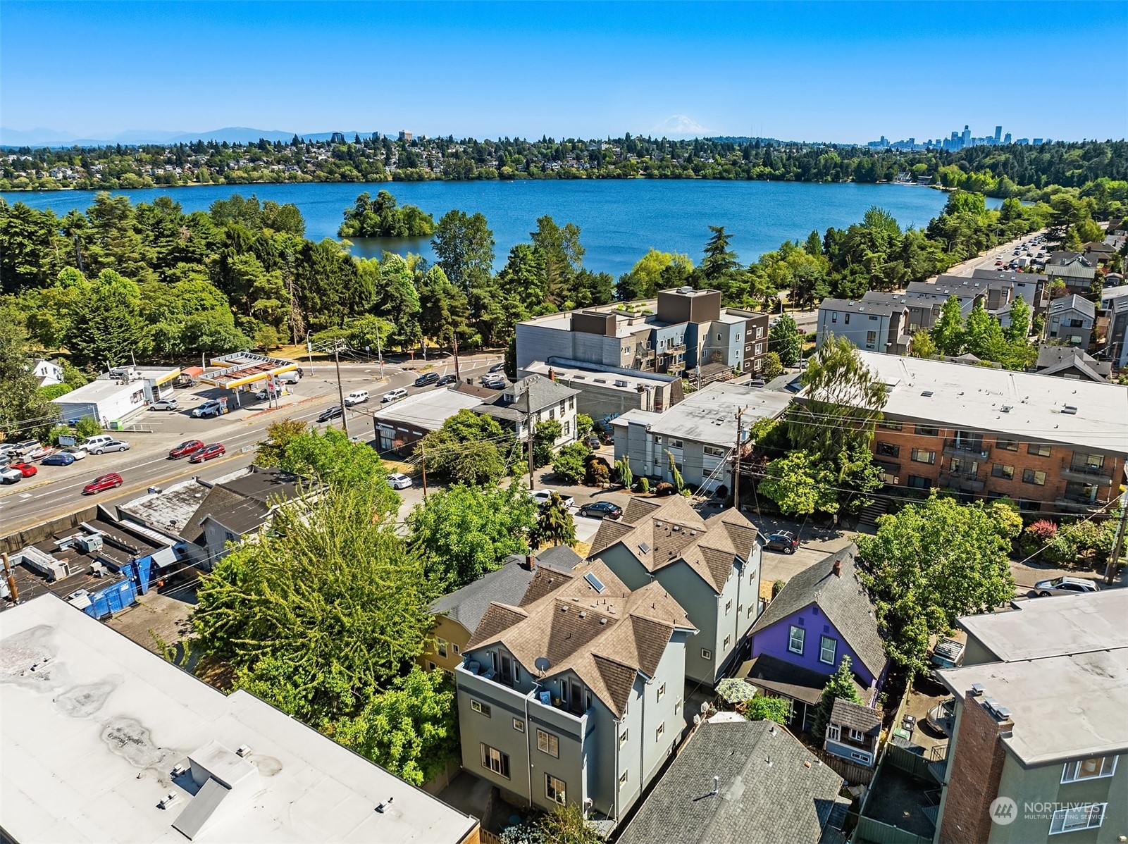 an aerial view of a house with a lake view