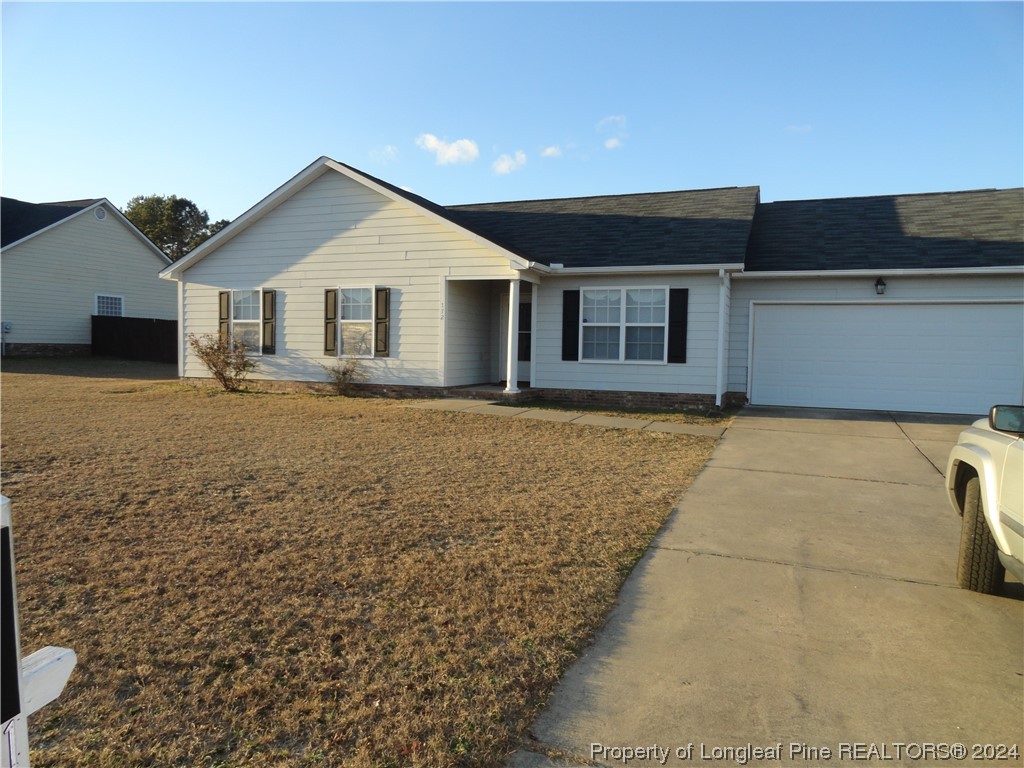 a front view of house with yard