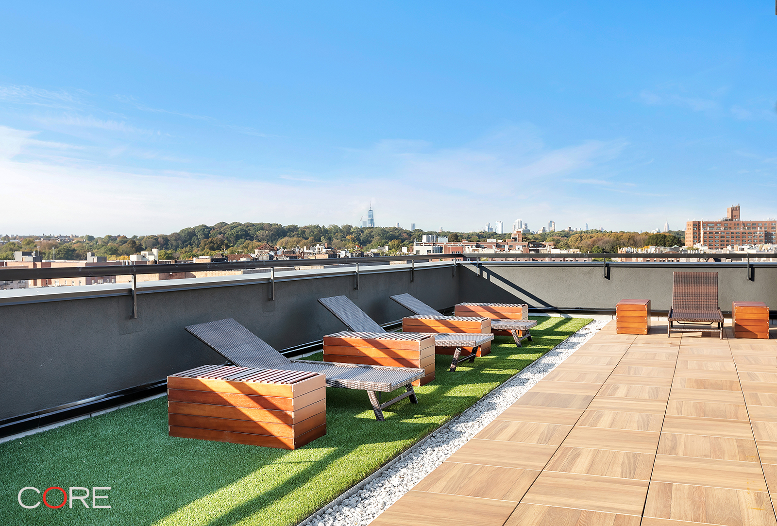 an outdoor sitting area with a lake view