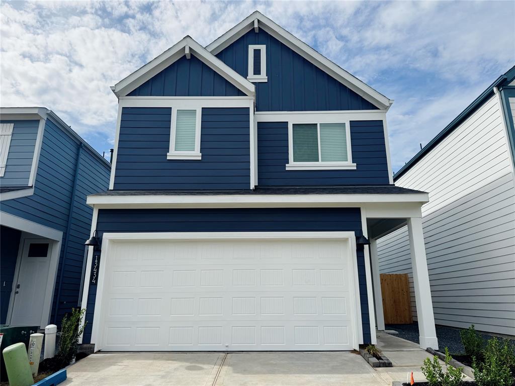 a view of a house with garage