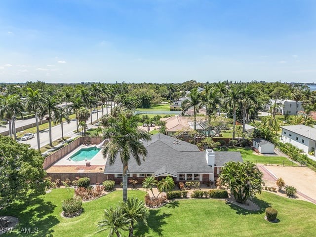 an aerial view of residential house with outdoor space