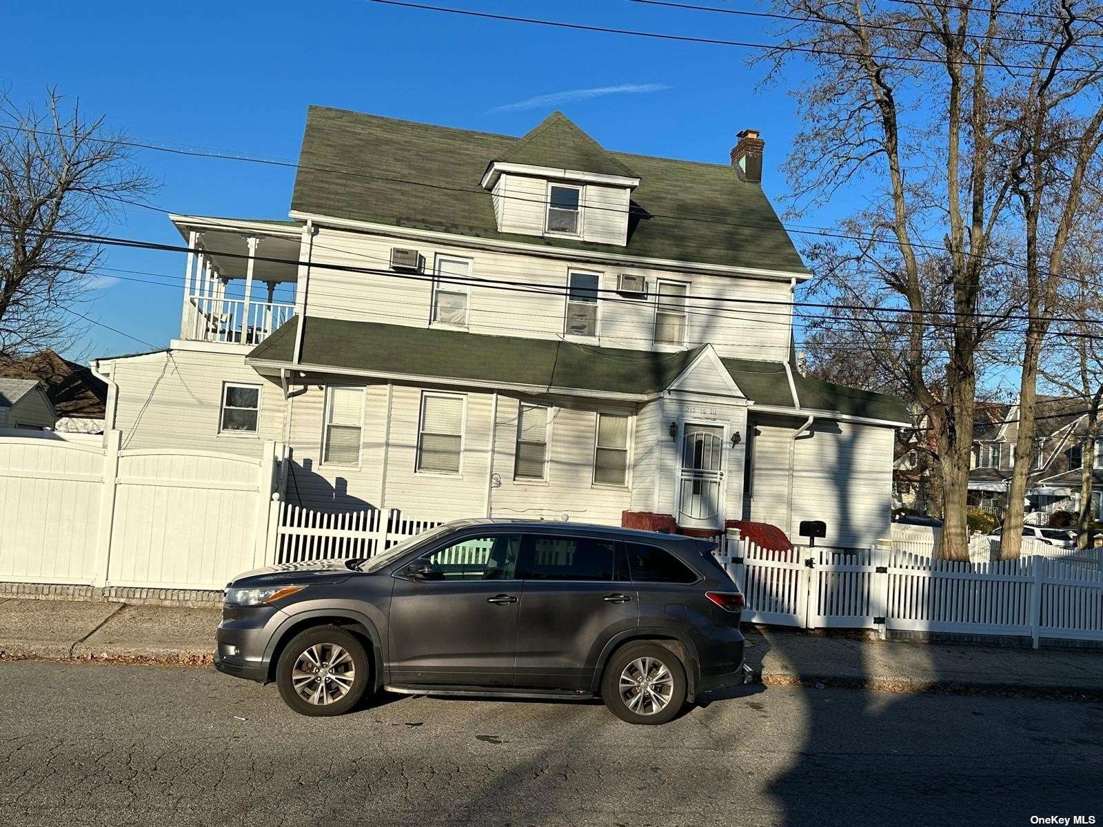 a car parked in front of a building