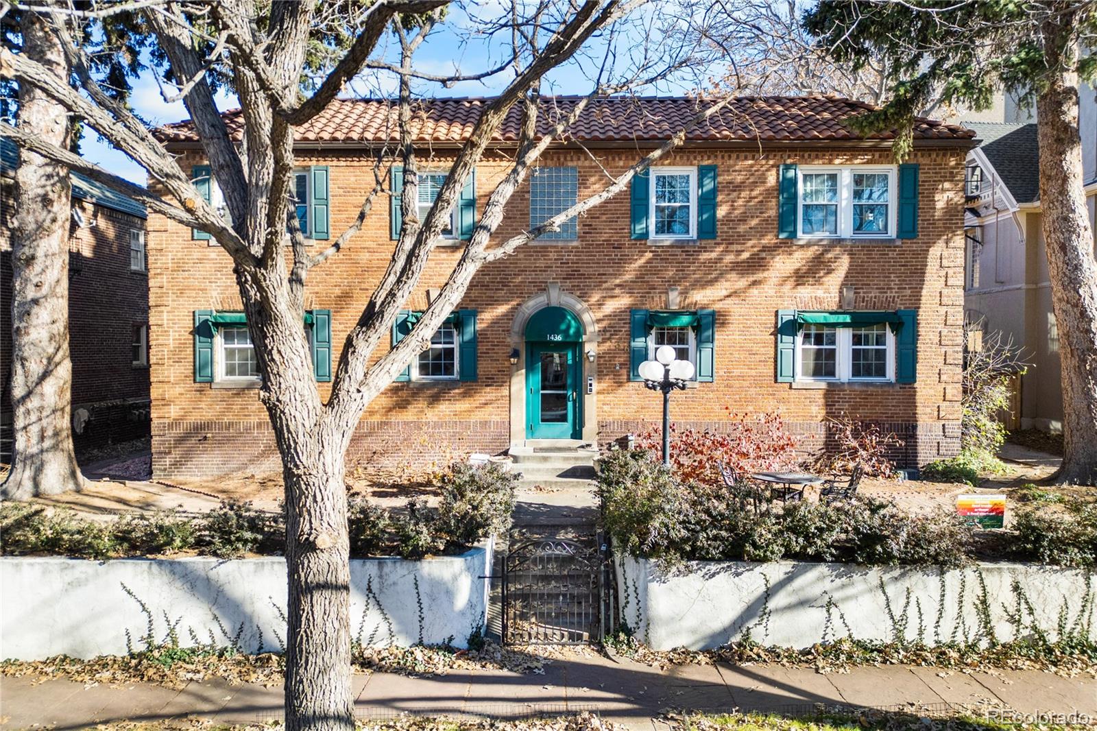 front view of a house with a trees