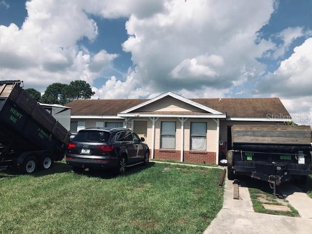 a car parked in front of a house