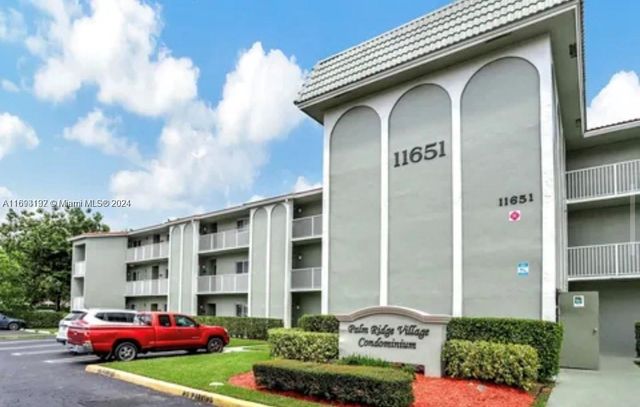 $215,000 | 11651 Royal Palm Boulevard, Unit 204 | Country Club