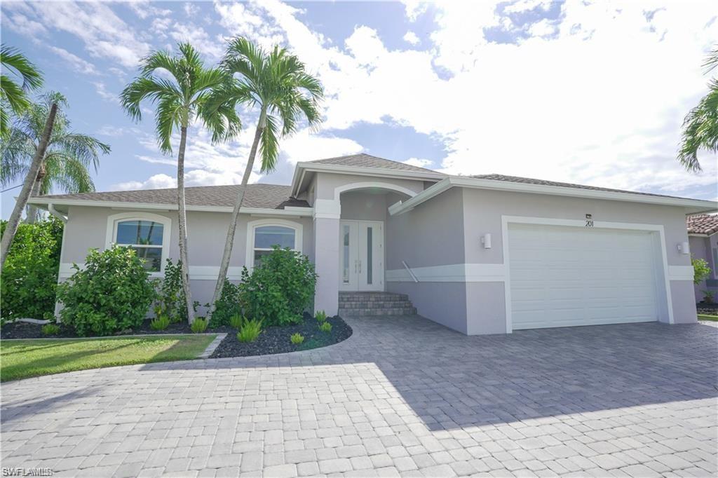 View of front of home with a garage