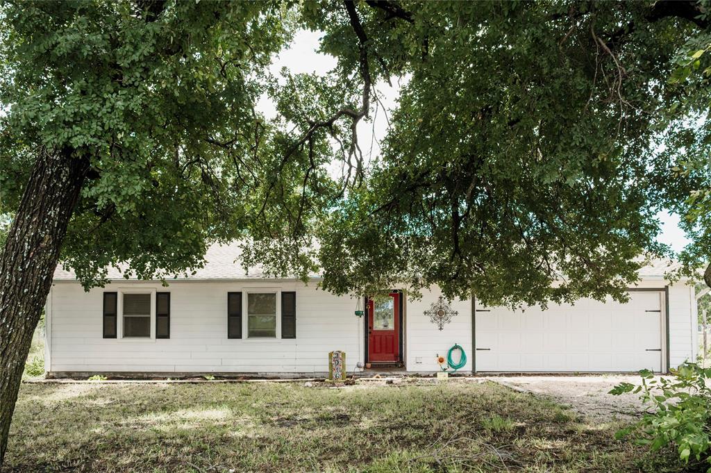 a front view of house with yard