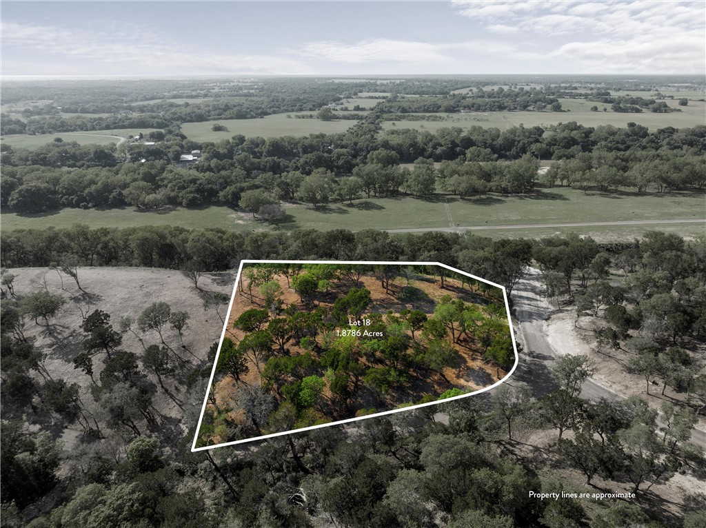 an aerial view of house with mountain view