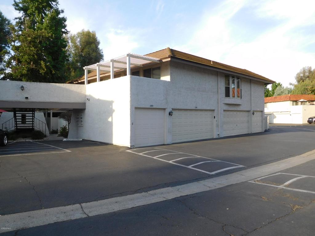 a front view of a house with a garage