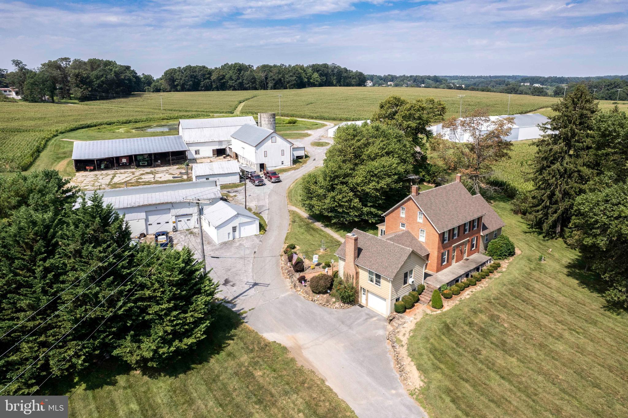 Custom home with many functional outbuildings