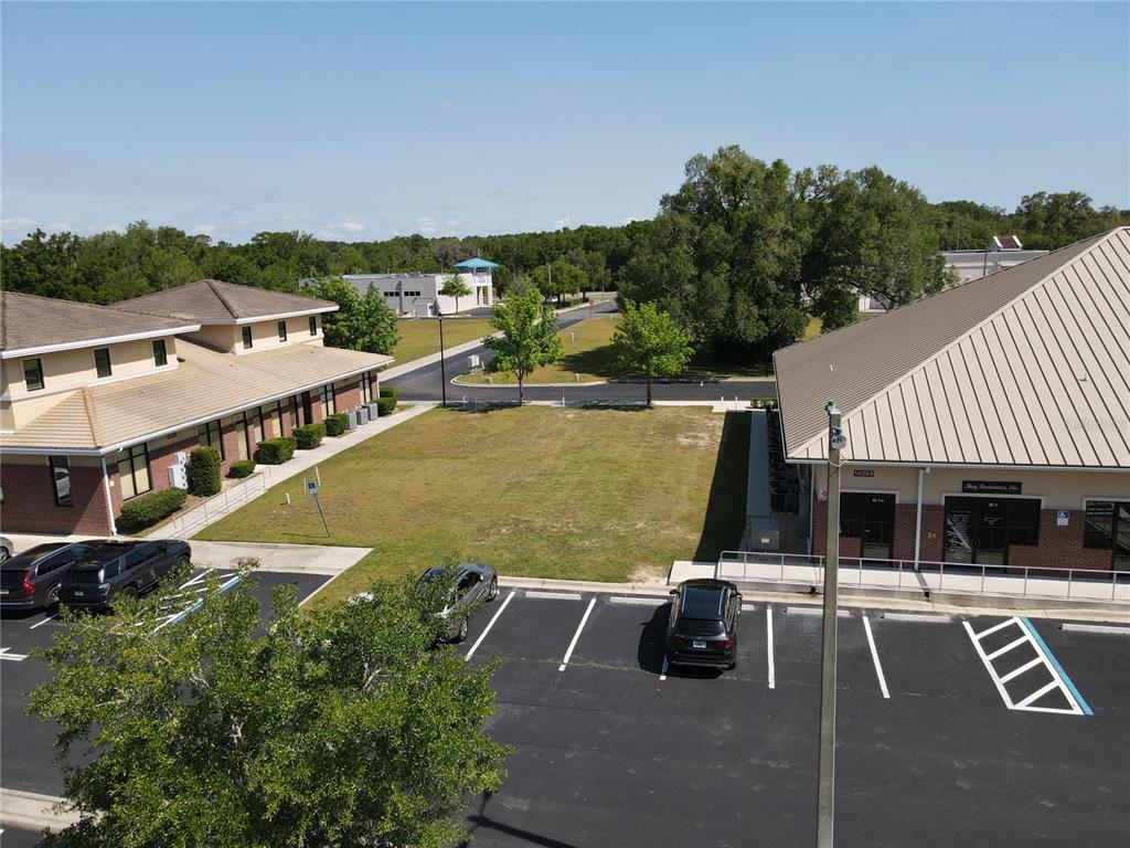 an aerial view of a house with a swimming pool