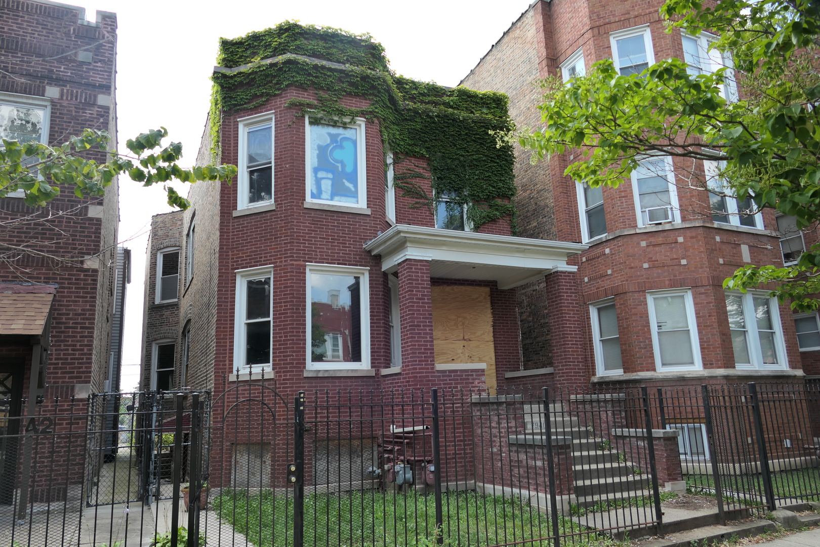 a front view of a house with balcony