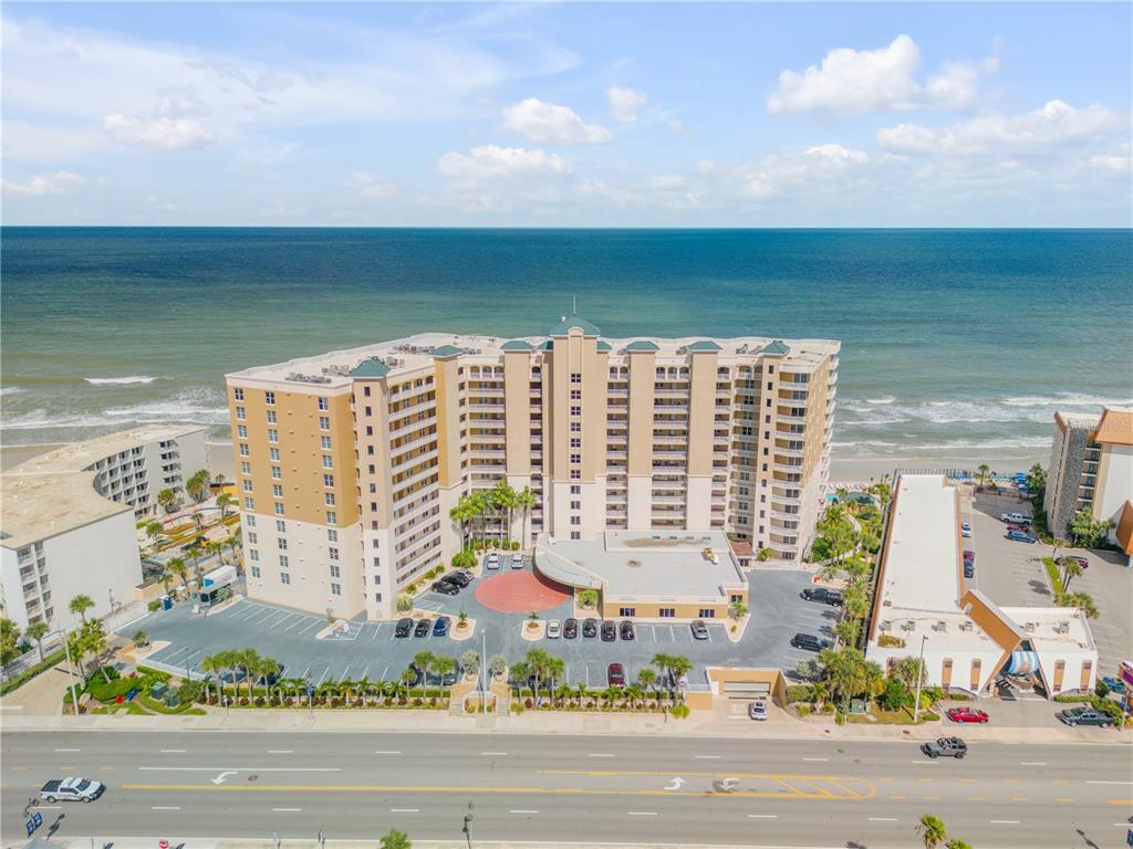 a view of building with an ocean space