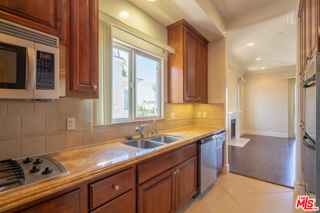 a bathroom with a sink double vanity and a mirror